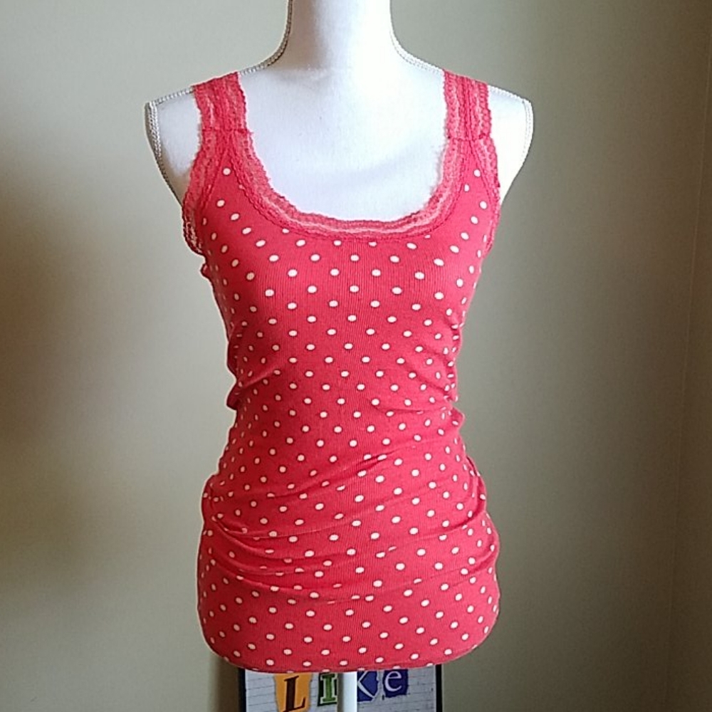 Coral tank with white polka dots and lace trim